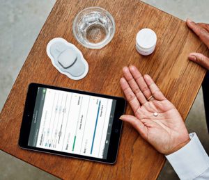 ipad-pill-hand-1