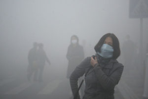 Girl Walks Through Smog In Beijing, Where Small-Particle Pollution Is 40 Times Over International Safety Standard (3/43), Kyodo News, 2015