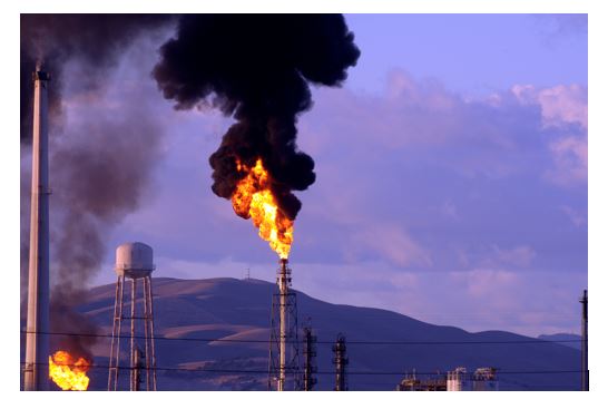 Figure 1. In a refining process, flares are used as a safety design, to alleviate pressurized gas by burning and releasing it into the air. [11]