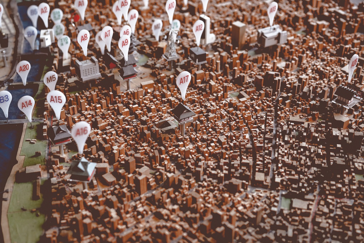 Raised map of a city with pins
