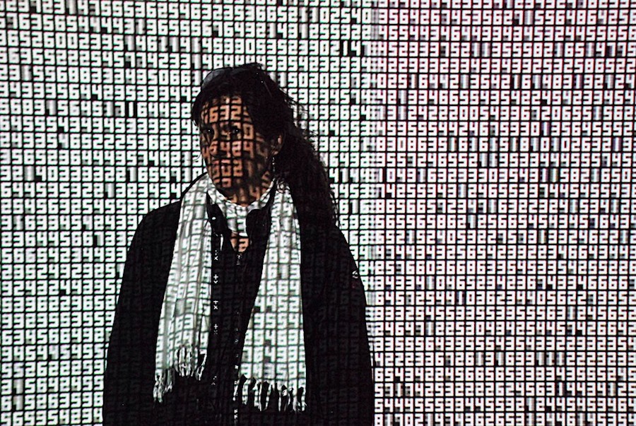 Woman covered in numbers