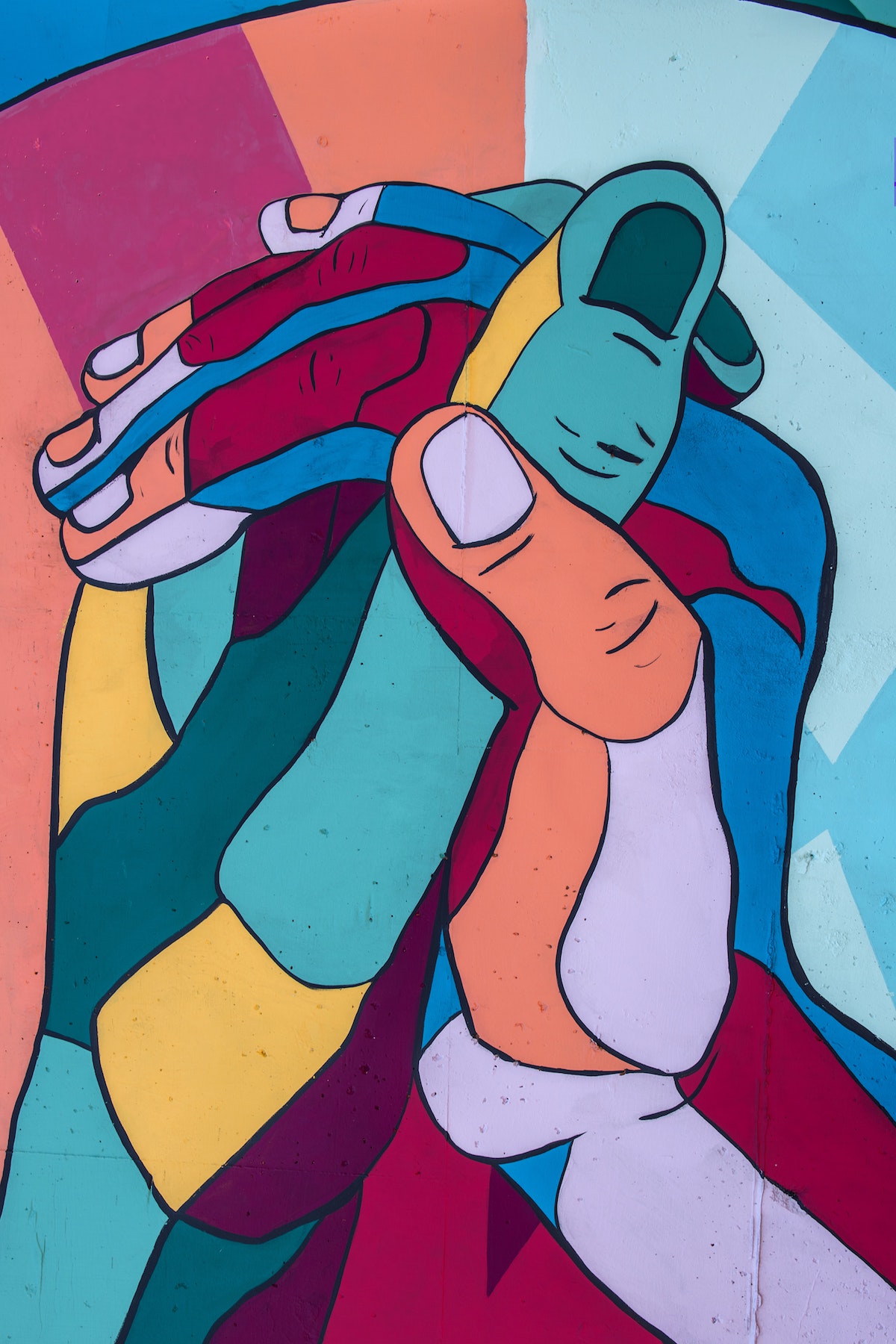 Colorful folded hands