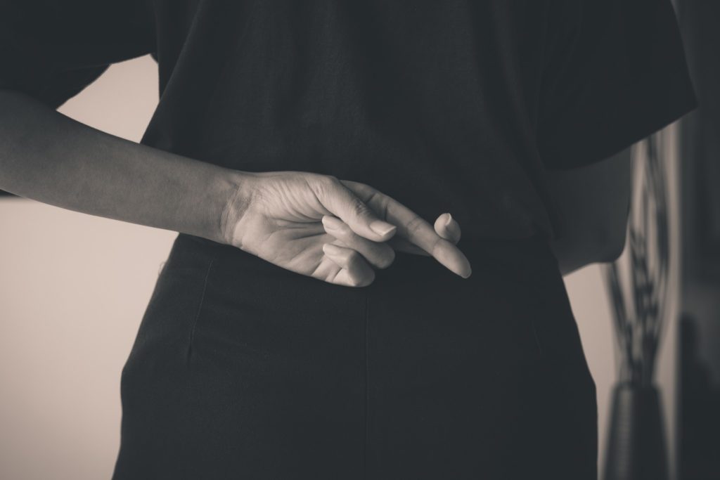Crossed fingers
